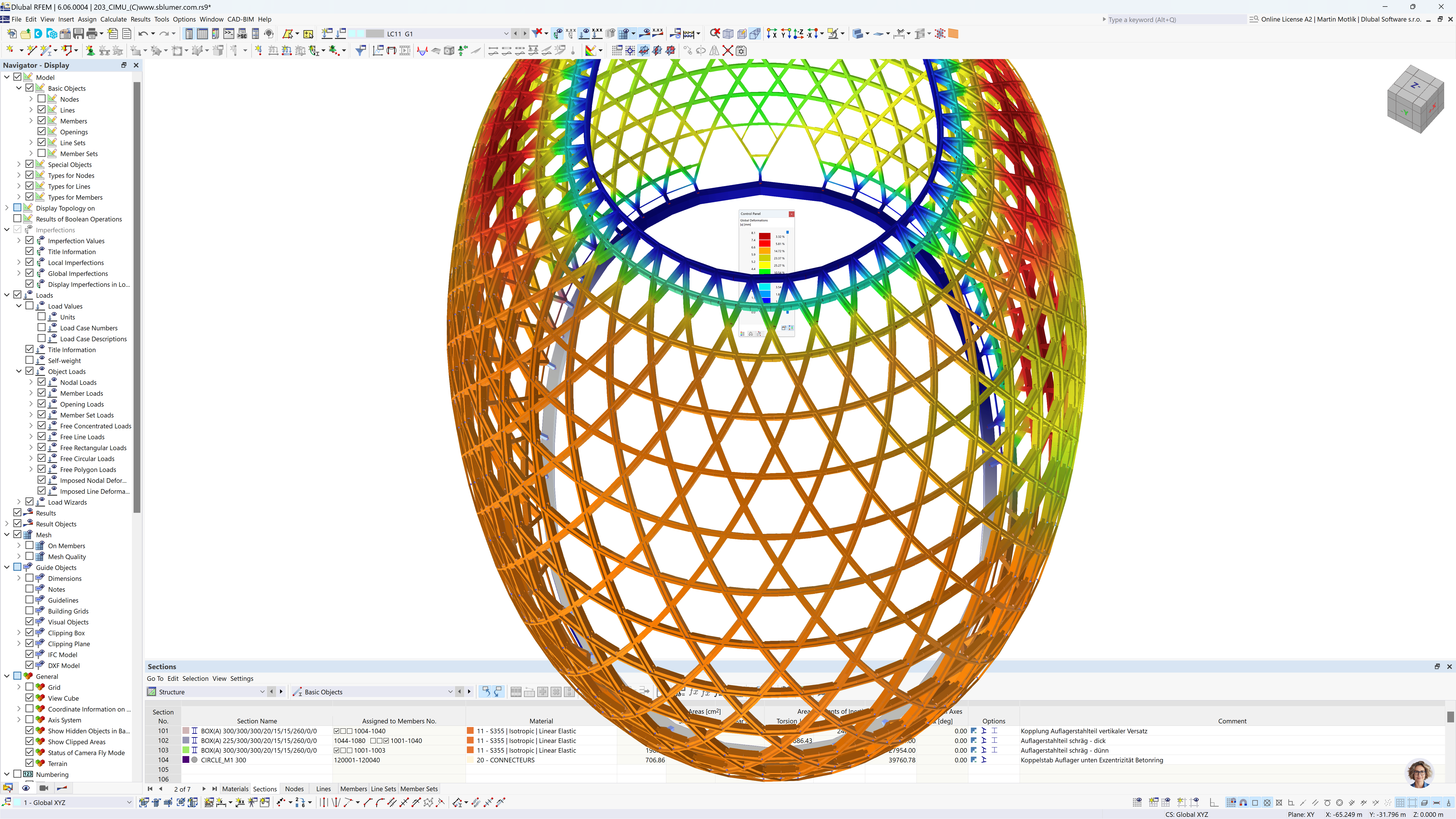 Esta imagem apresenta uma captura de ecrã do software de cálculo estrutural RFEM, possivelmente utilizado para engenharia civil ou arquitetura. A vista principal mostra um modelo 3D de uma estrutura de treliça toroidal multicolorida, em que cada cor representa, provavelmente, diferentes valores de tensão ou materiais.